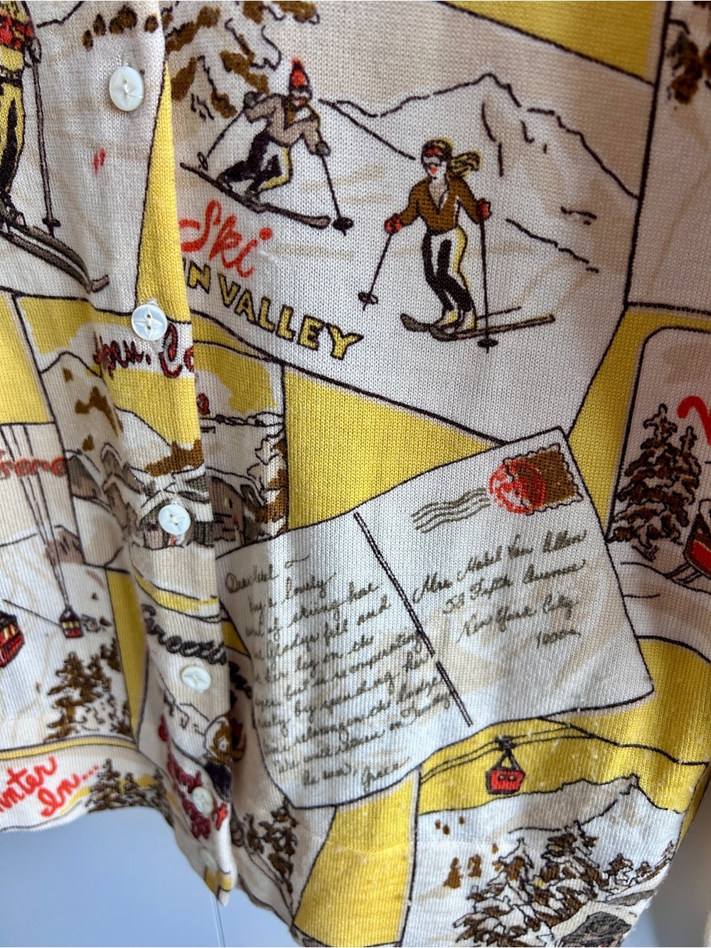 Vintage J Cree Ski Resort Postage Stamp Print Cardigan in Yellow & Cream - Picture 4 of 7